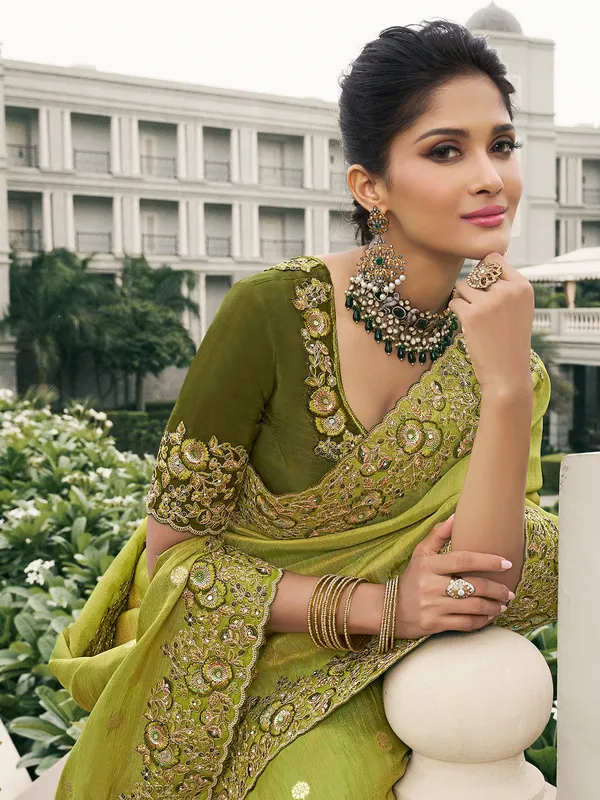 Green tissue silk saree with traditional touch