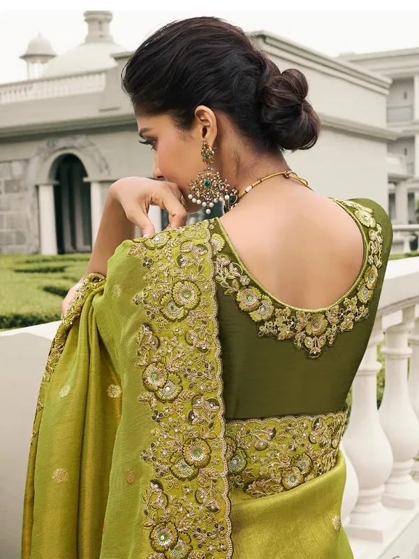 Green tissue silk saree with traditional touch