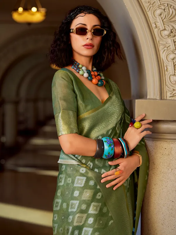 Green tissue silk saree with zari work