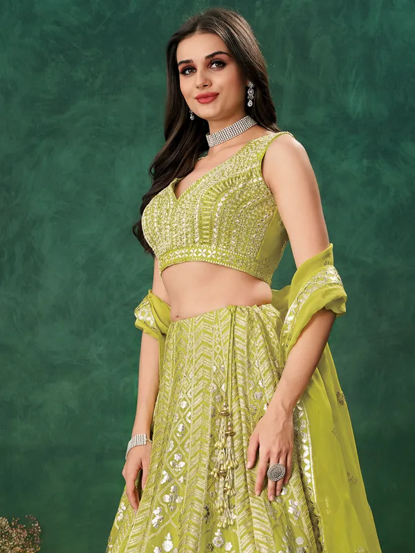 Green wedding wear lehenga choli in soft organza