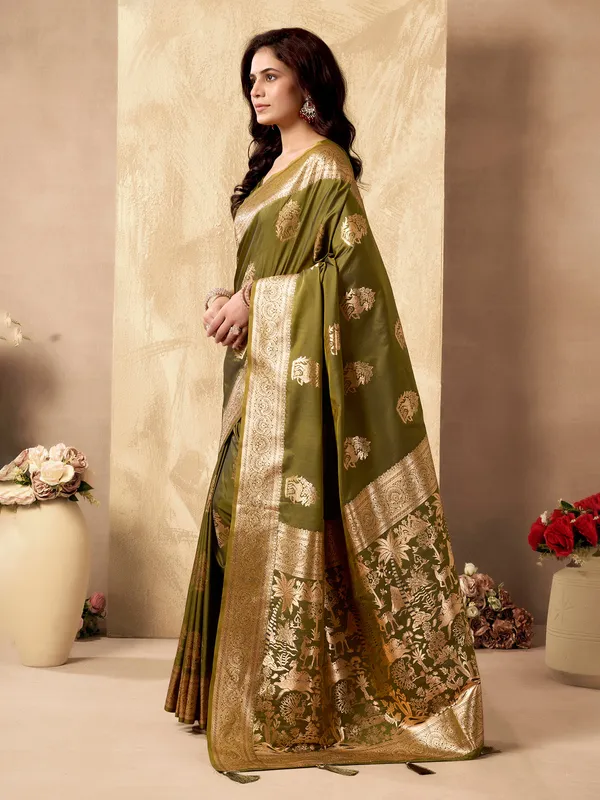 Green zari silk saree for celebrations