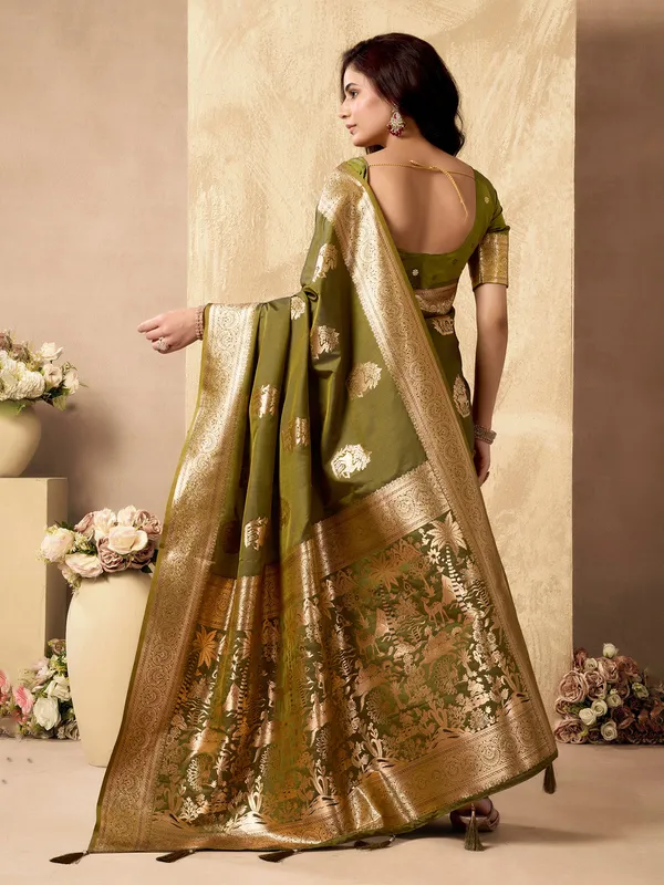 Green zari silk saree for celebrations