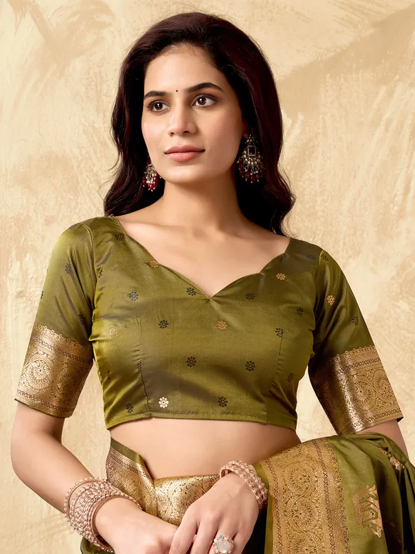 Green zari silk saree for celebrations