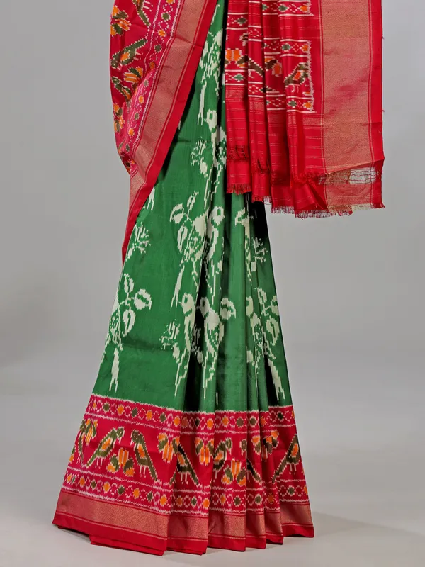 Green zari weaving patola silk saree for mehendi festivities