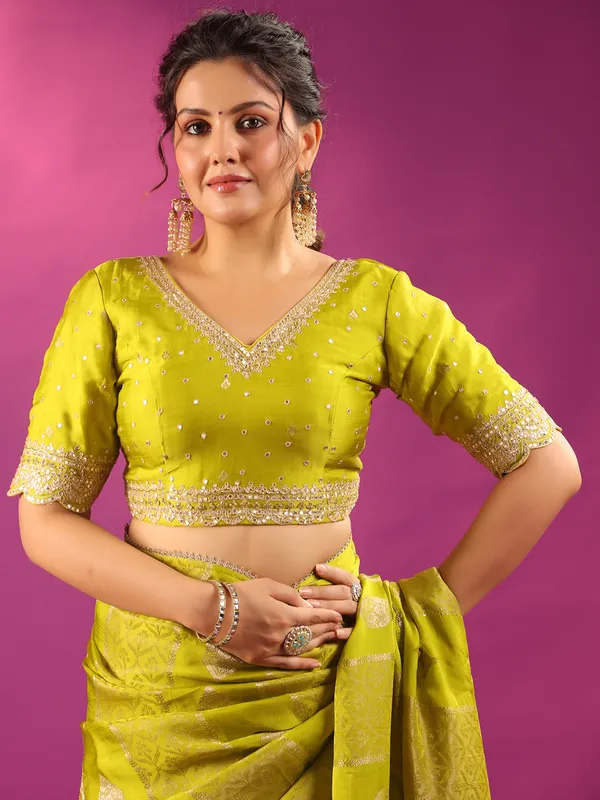 Green zari worked silk saree for mehendi celebration