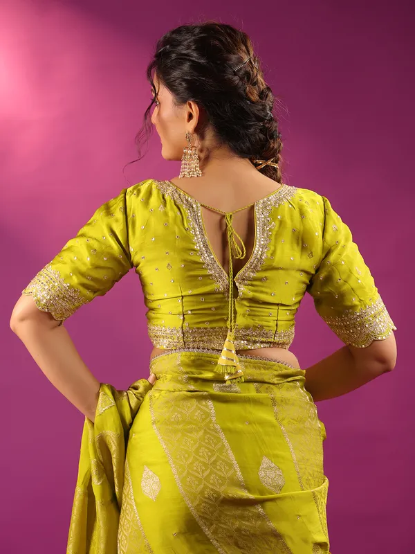 Green zari worked silk saree for mehendi celebration