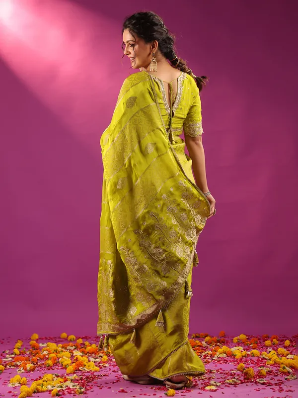 Green zari worked silk saree for mehendi celebration