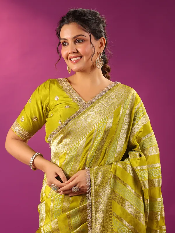 Green zari worked silk saree for wedding wear