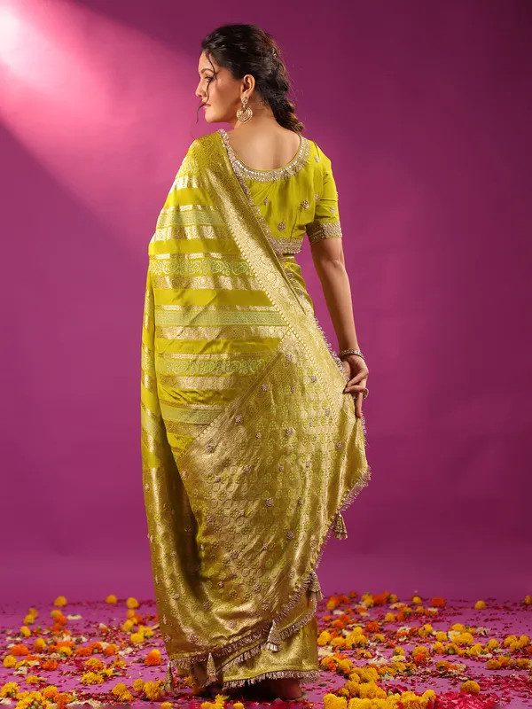Green zari worked silk saree for wedding wear