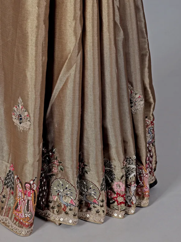 Grey and gold embellished tissue silk saree