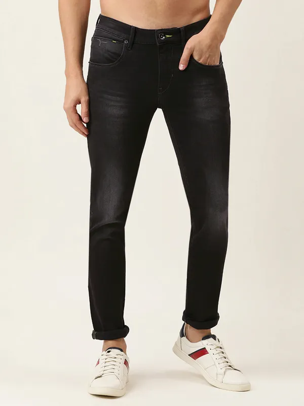 Grey colored denim jeans of flying machine