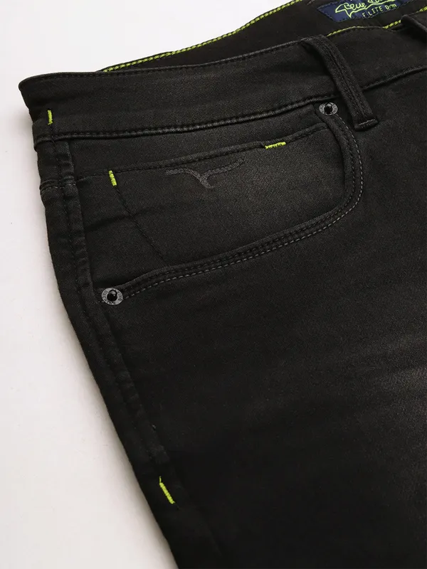 Grey colored denim jeans of flying machine