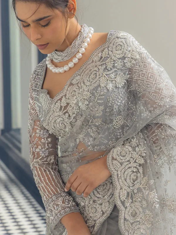 Grey net saree with sequins work