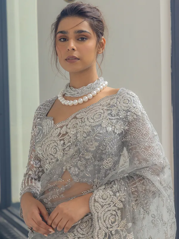 Grey net saree with sequins work