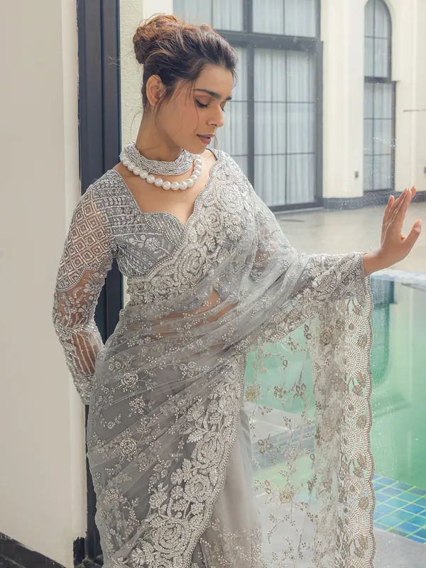 Grey net saree with sequins work