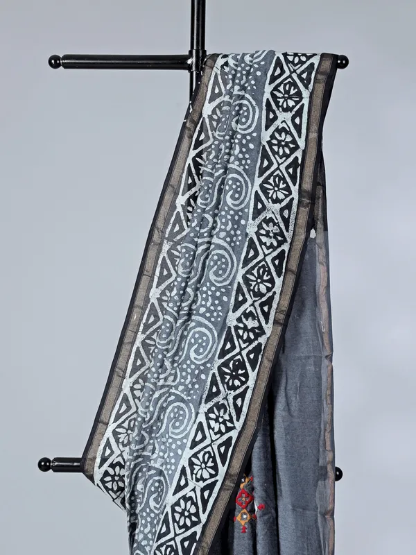 Grey printed tusser silk saree with thread work