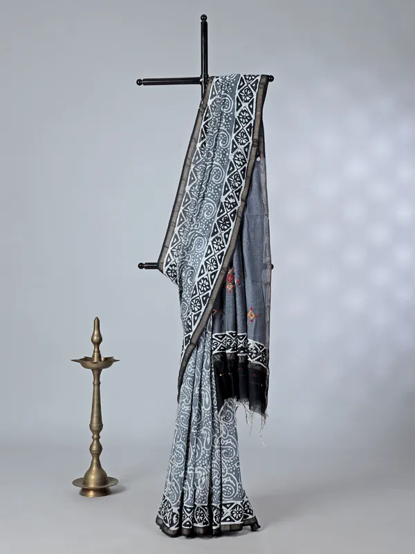 Grey printed tusser silk saree with thread work