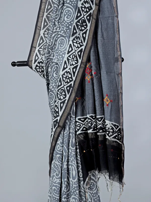 Grey printed tusser silk saree with thread work