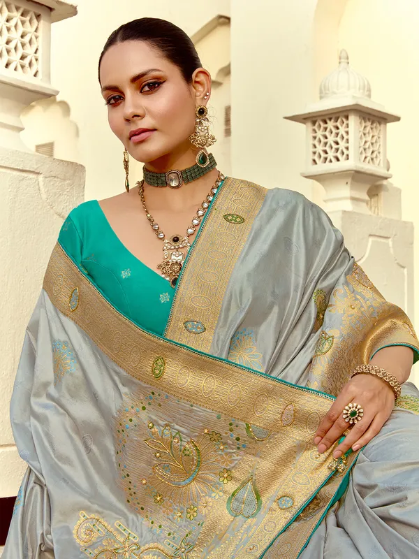 Grey silk saree with cutdana work