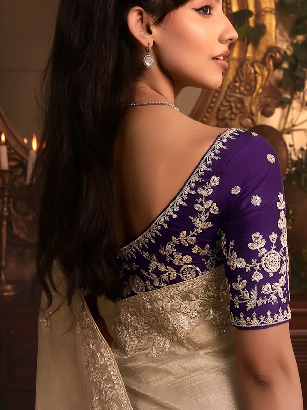 Grey tissue organza saree with purple blouse