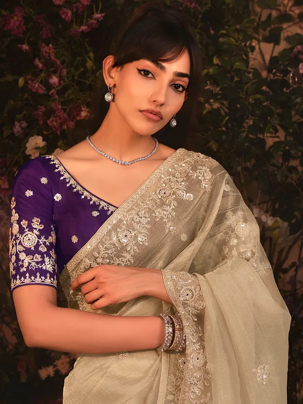 Grey tissue organza saree with purple blouse