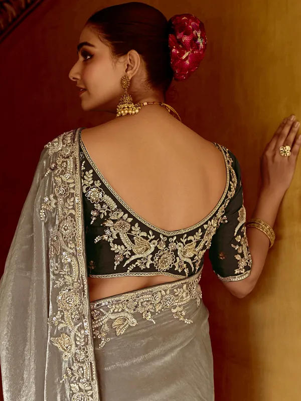 Grey tissue silk saree with sequins work