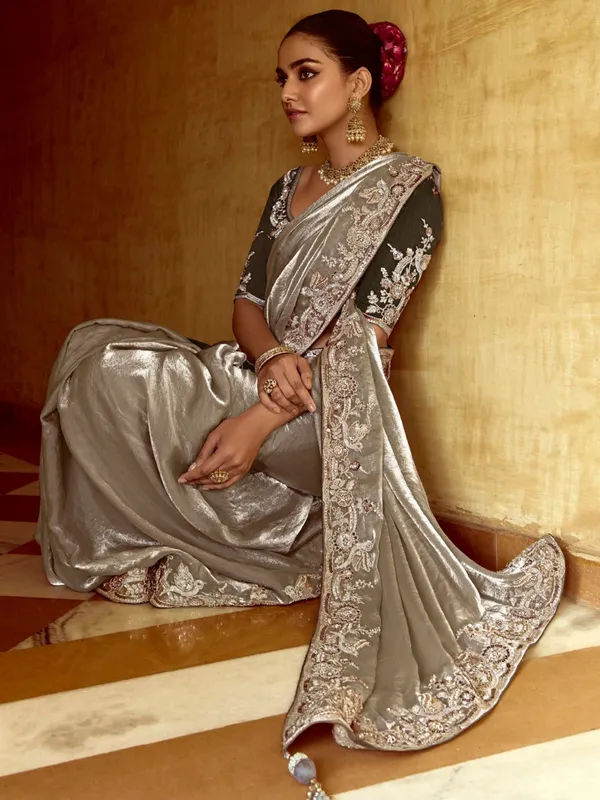 Grey tissue silk saree with sequins work