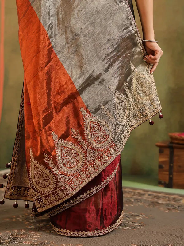 Grey tissue silk saree with unstitched blouse