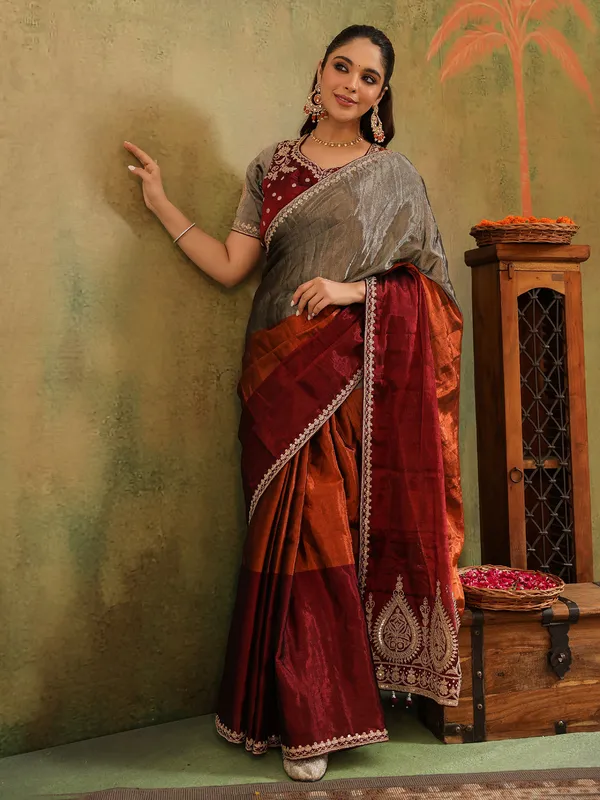 Grey tissue silk saree with unstitched blouse