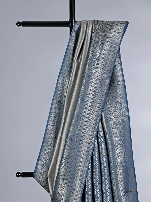 Grey tissue silk saree with zari border