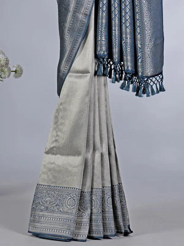 Grey tissue silk saree with zari border