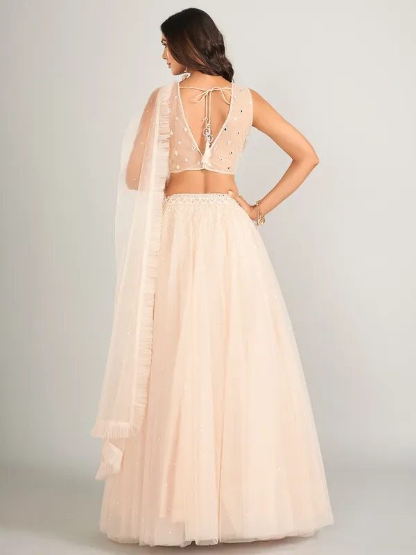 Heavy cream net lehenga choli for wedding