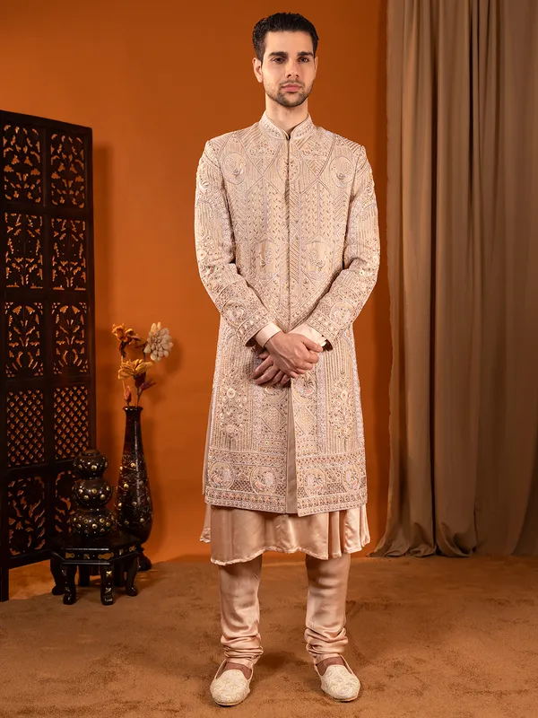 Heavy worked cream silk wedding sherwani for groom