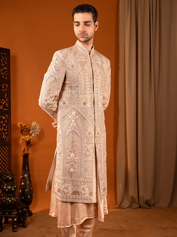 Heavy worked cream silk wedding sherwani for groom