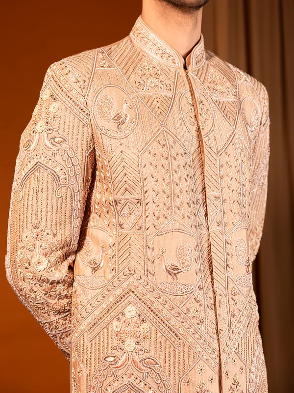 Heavy worked cream silk wedding sherwani for groom