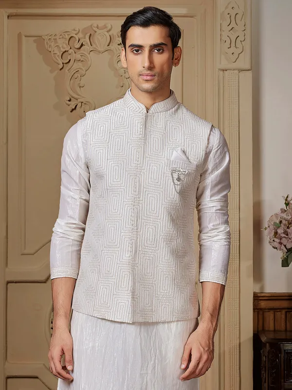 Impressive ivory silk waistcoat set with sequins embellishment