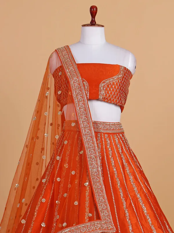 Impressive orange weding wear silk lehenga choli