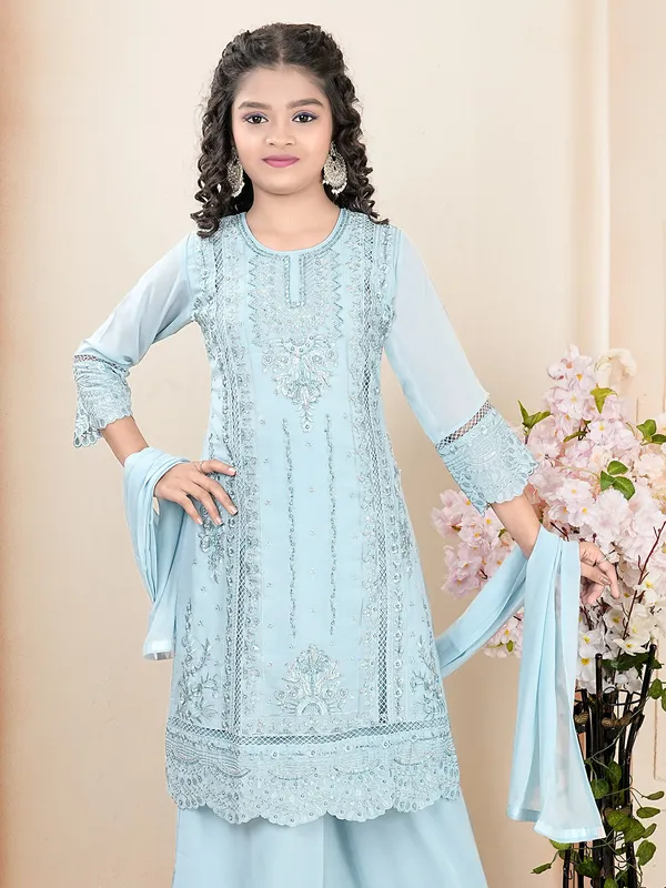 In silk light blue palazzo salwar suit