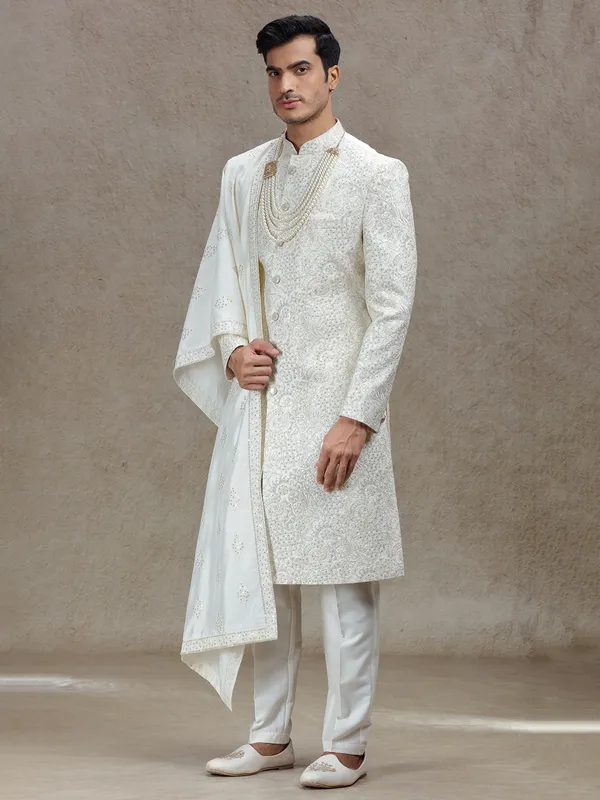Ivory cream silk sherwani with rich embellishments