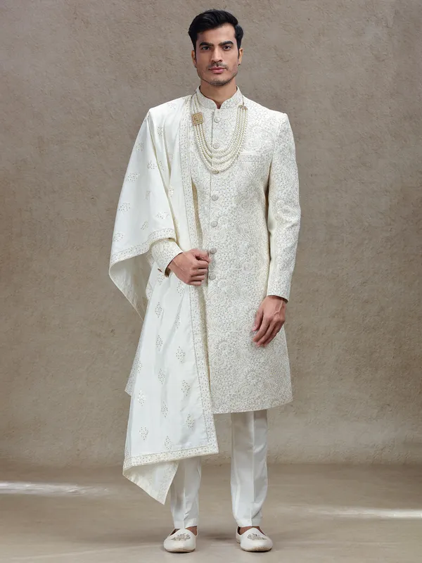 Ivory cream silk sherwani with rich embellishments