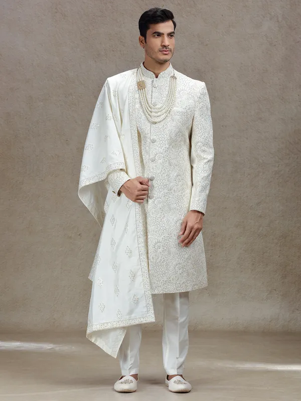 Ivory cream silk sherwani with rich embellishments
