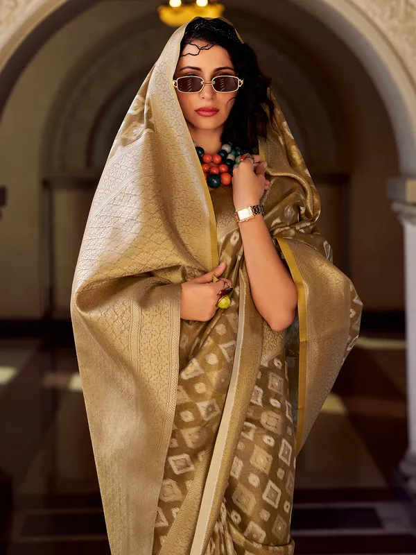 Khaki tissue silk zari worked saree