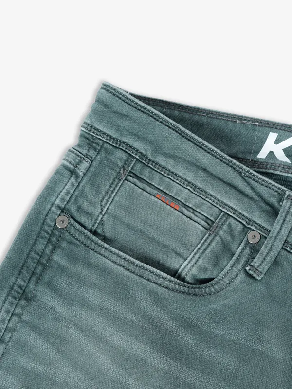 Killer teal green washed ankle fit jeans