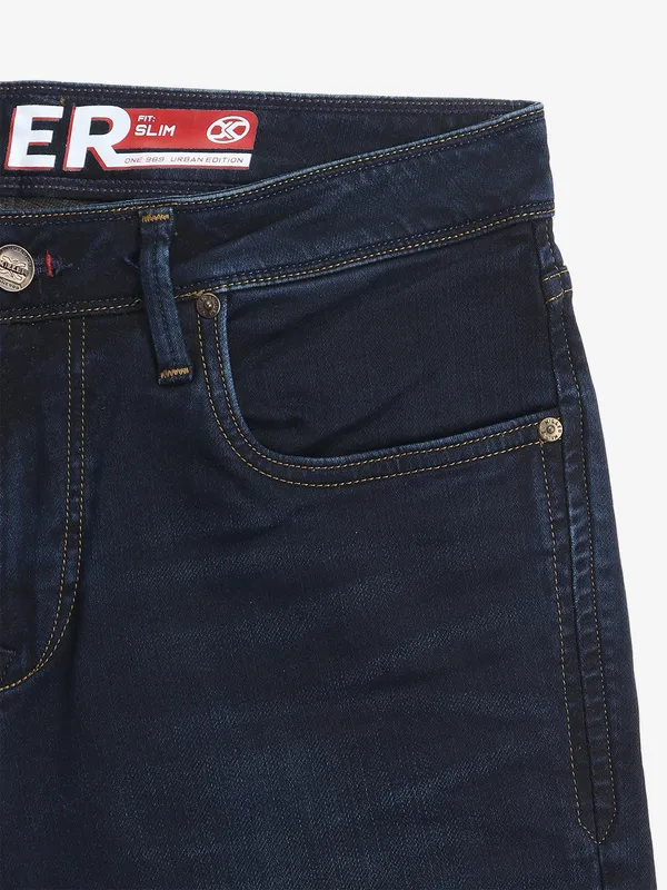 KILLER washed dark blue denim slim fit jeans