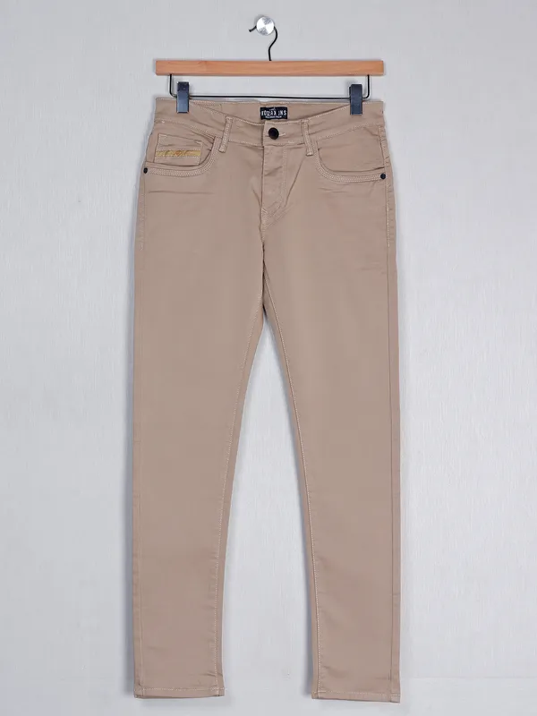 Kozzak dune beige solid denim jeans for men