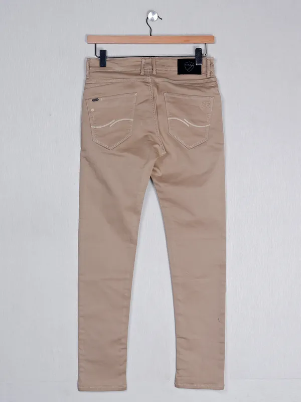 Kozzak dune beige solid denim jeans for men