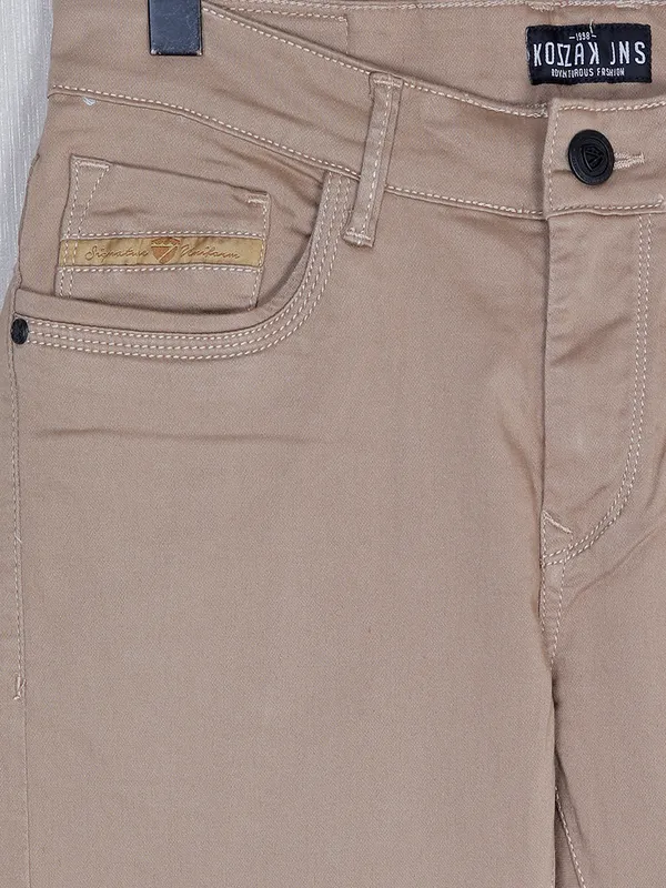 Kozzak dune beige solid denim jeans for men
