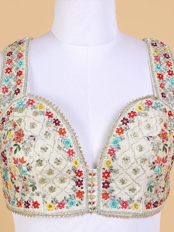 Latest beige lehenga choli with embroidery
