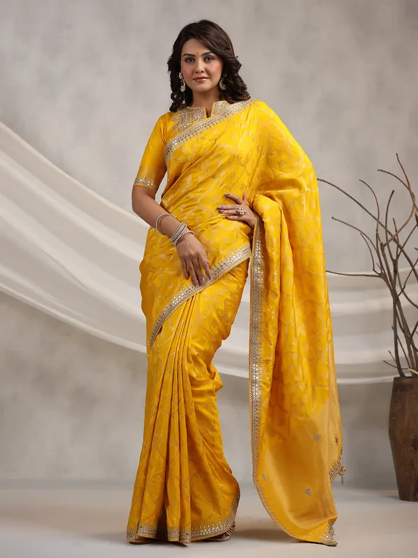 Latest bright yellow silk saree