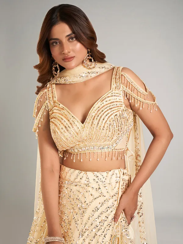 Latest cream net lehenga choli for wedding